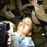 Jessica is rescued on a stretcher Jessica is rescued on a stretcher